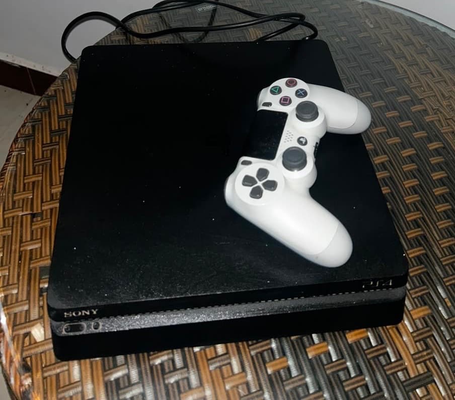 Sony PlayStation 4 1TB Black with 3 Controllers and 5 Games - Image 1 of 1