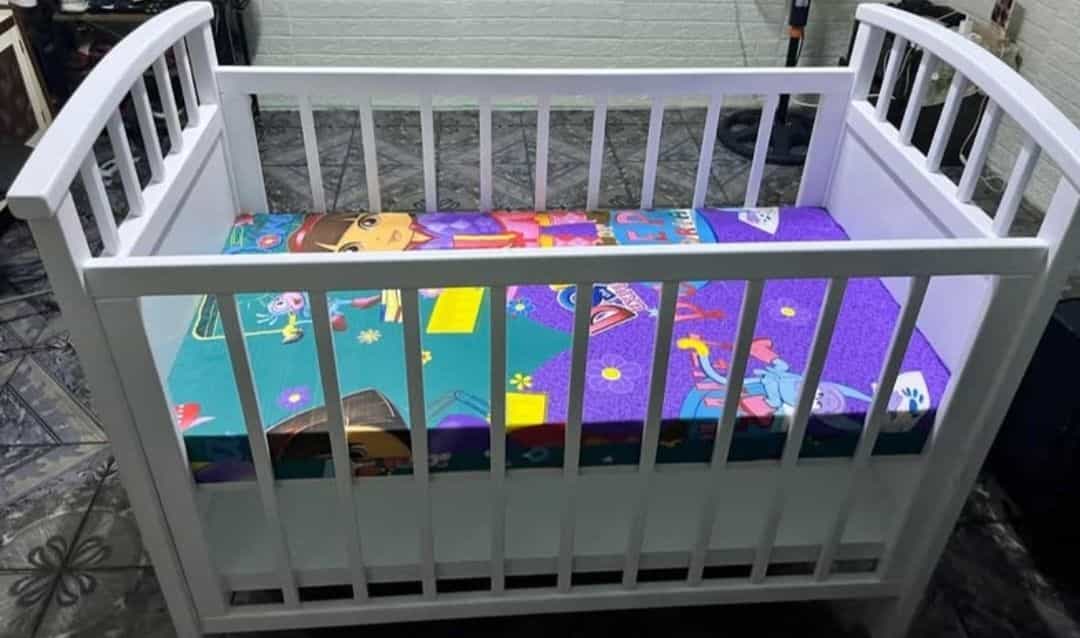 White Wooden Baby Cot